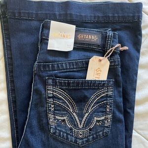 SHYANNE WOMEN'S CHANDELIER POCKET HIGH RISE FLARE JEANS